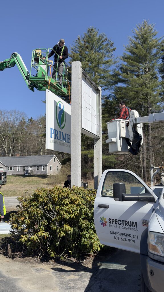 removing the old sign in Chichester