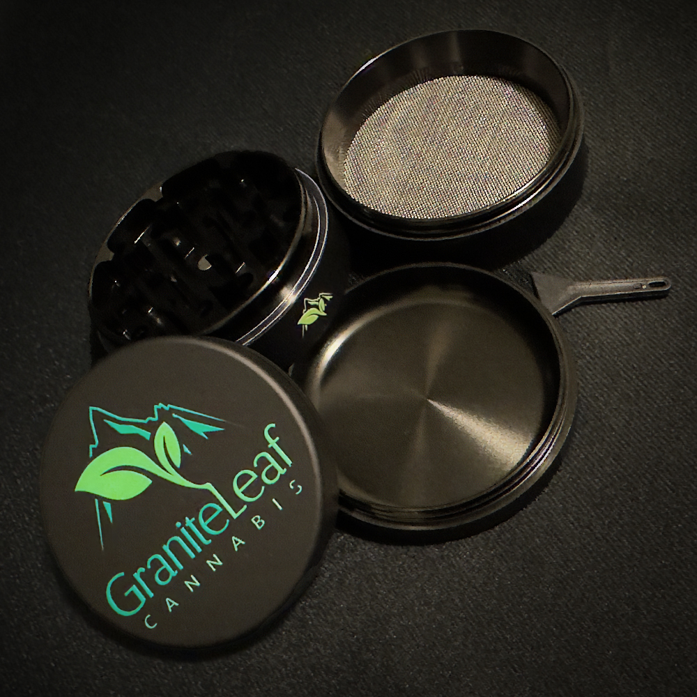 GraniteLeaf Cannabis branded grinder in black showing the different sections of the grinder and the contents of the purchased package.