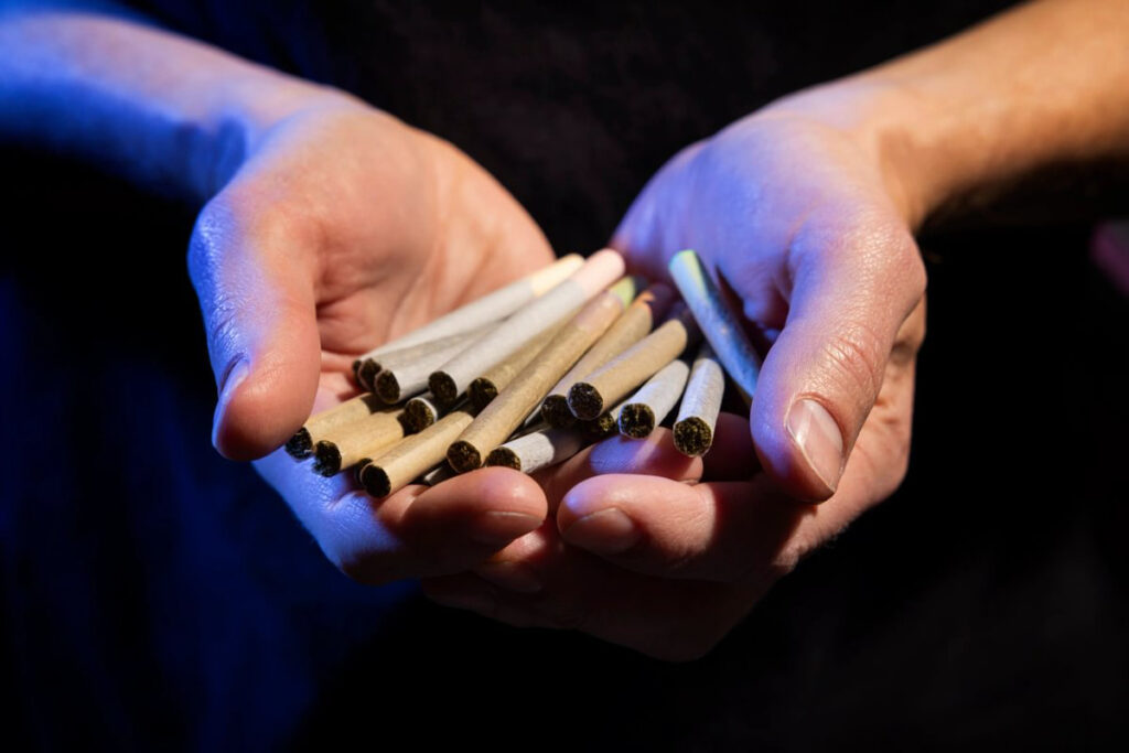 handful of rolled pre-rolls